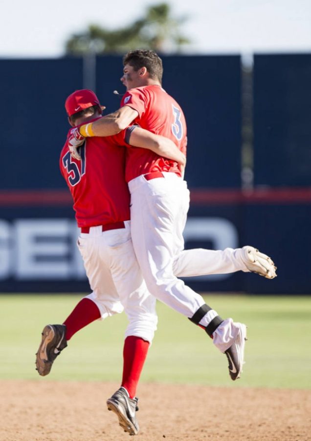Courtesy of Emily Gauci/Arizona AthleticsThird baseman Bobby Dalbec (3) and pitcher Cody Moffett (37) celebrate during the Wildcats win over UCLA at Hi Corbett Field on Saturday, March 26. Arizona dedicated its victory to Josh Weaver, a fan who died before the season began. 