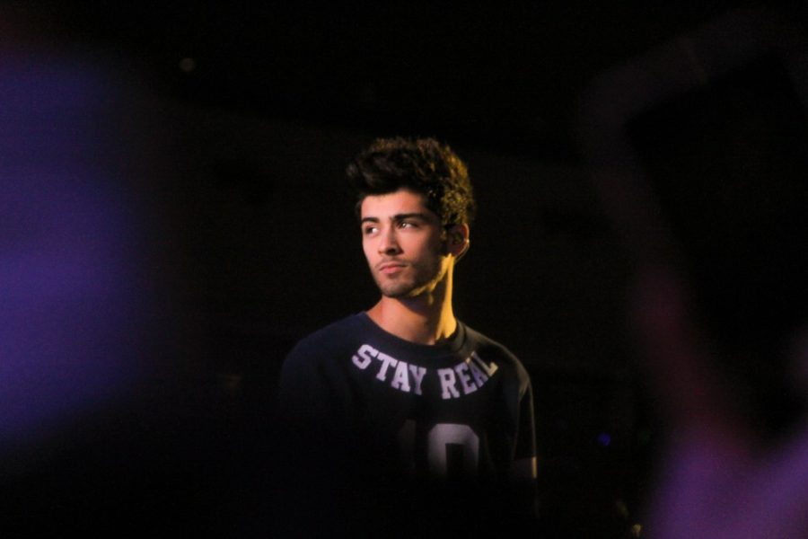 Zayn Malik at One Directions Where We Are Tour in April, 2014. Malik released his first solo album Mind of Mine on the anniversary of his leaving One Direction.