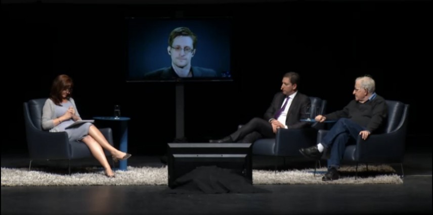 (From left) Moderator Nuala OConnor, president and CEO of the Center for Democracy and Technology, former NSA analyst Edward Snowden (on video screen), Pulitzer Prize-winning journalist Glenn Greenwald and MIT professor emeritus and renowned political activist and theorist collectively graced the stage March 25 at the UAs Centennial Hall for A Conversation on Privacy, hosted by the College of Social and Behavioral Sciences.