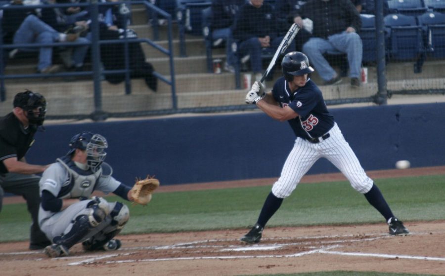 Former Arizona centerfielder Joey Rickard prepares to swing during a match against Rice on Feb 14, 2012. 