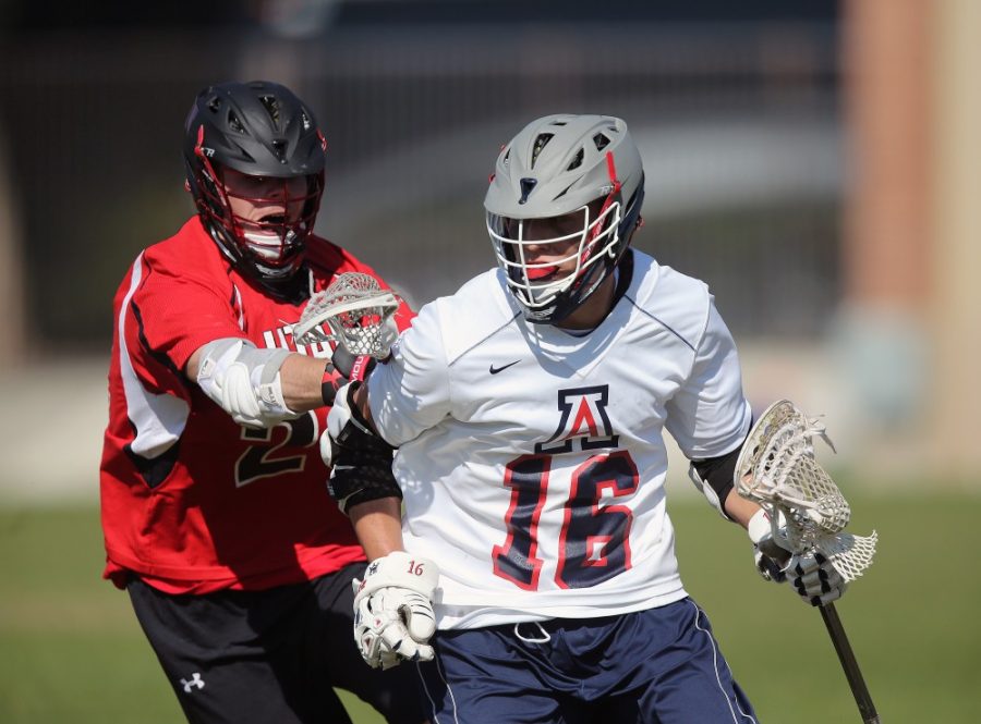 Arizona midfielder Matt Lai (16) leads the offense against Utah in Tucson on Feb. 14. The Laxcats have found a lot of success this season and are ranked seventh in the nation. 