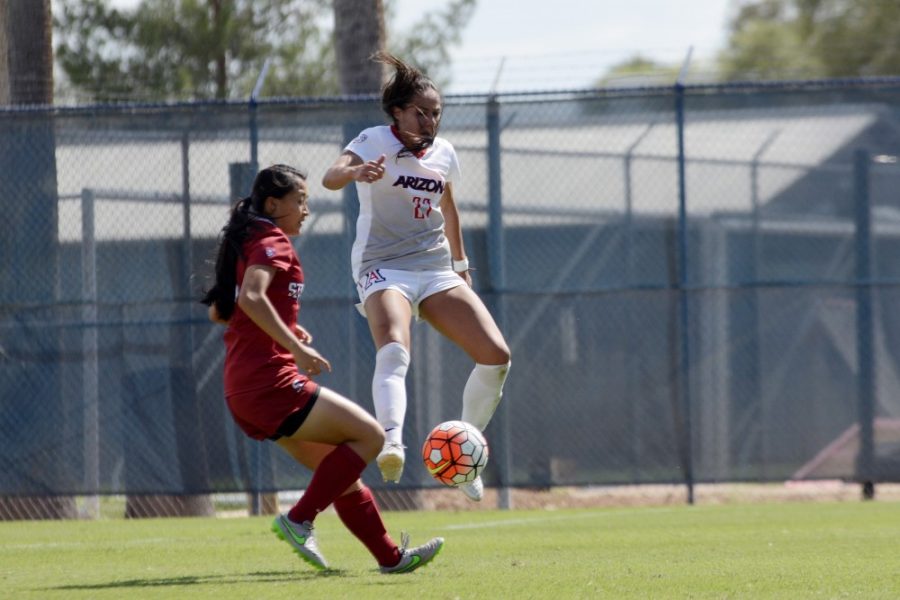 Arizona midfielder Laura Pimienta (27) evades a Stanford defender on Oct. 4, 2015.