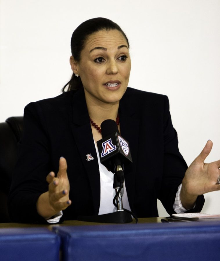 Newly hired Arizona womens basketball coach Adia Barnes speaks to members of the press and her team at McKale Center on Tuesday, April 5. Barnes, who played at Arizona from 1994-1998, is the programs all-time leading scorer. 