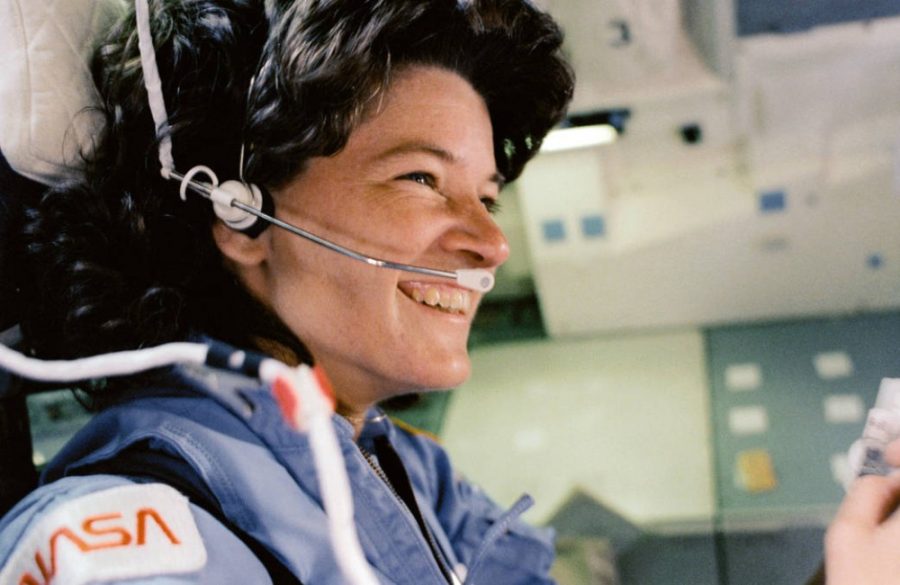 Sally Ride sits sits in the aft flight deck mission specialists seat during deorbit preparations in 1983.