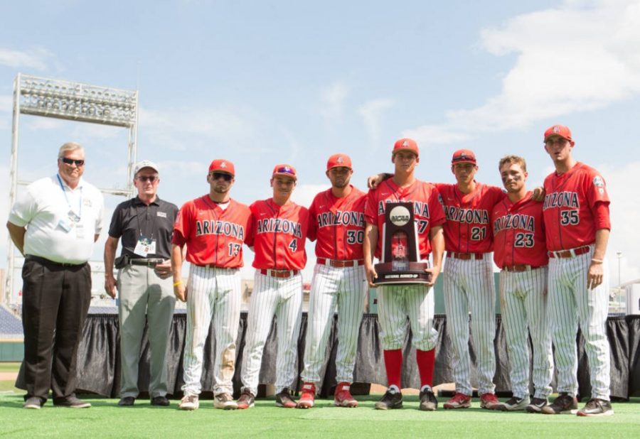 The Arizona baseball teams accepts the runner-up trophy at the College World Series in Omaha, Nebraska on June 30. The Wildcats lost 4-3 to Coastal Carolina in the final game of championship series.