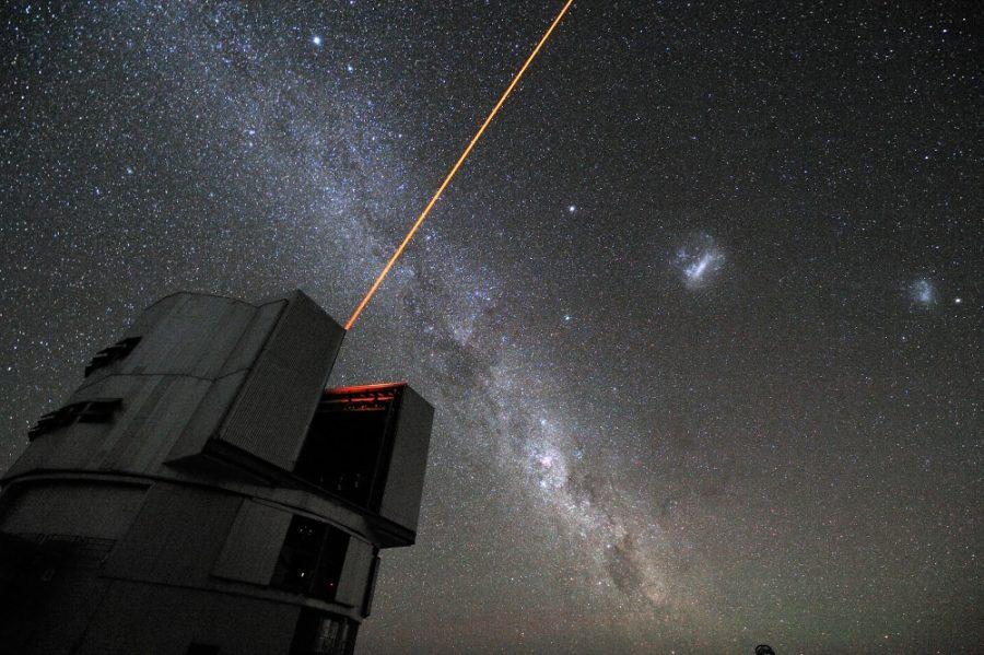 A laser beam launched from VLT´s Yepun telescope crosses the sky to creates an artificial star