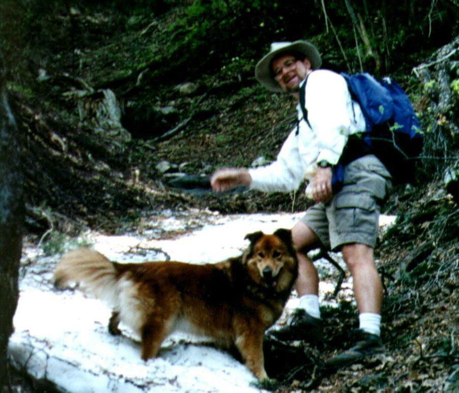 The late UA physics professor Roger Haar hiking with his dog Goldie.