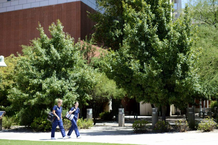 Senior Nursing Students Taylor Weidner and Victoria Towers head home after class outside the College of Medecine on Tuesday, Aug. 23, 2016.