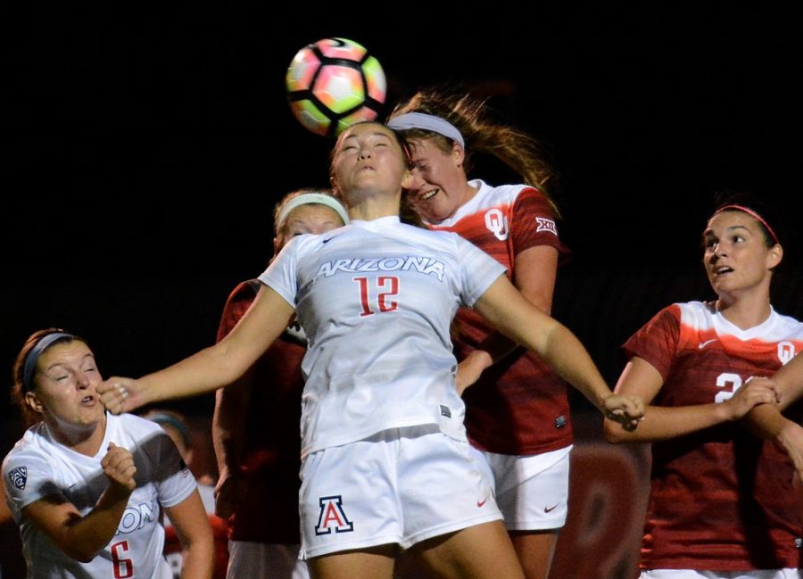 Arizona midfielder Kennedy Kieneker (12) beats Oklahoma to a header against Oklahoma at Murphey Field at Mulcahy Soccer Stadium on Friday, Sept. 16, 2016. Kieneker scored the Wildcats only goal against the Sooners, who won the matchup 2-1 for Arizonas first home loss of the season.