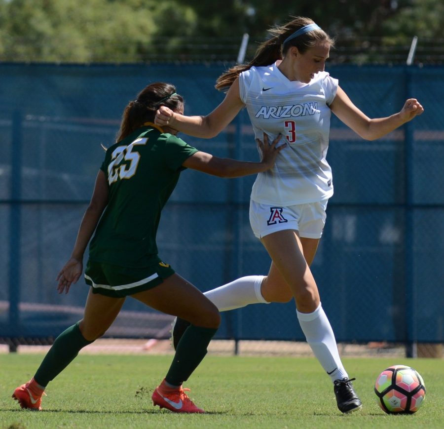 San Francisco defender Allison Arriola (25) gives Arizona midfielder Cali Crisler (3) a shove on the second day of the Arizona Cats Classic at Murphey Field at Mulcahy Soccer Stadium in Tucson, Ariz. on Sunday, Sept.11, 2016. The Wildcats won against the Dons 1-0.