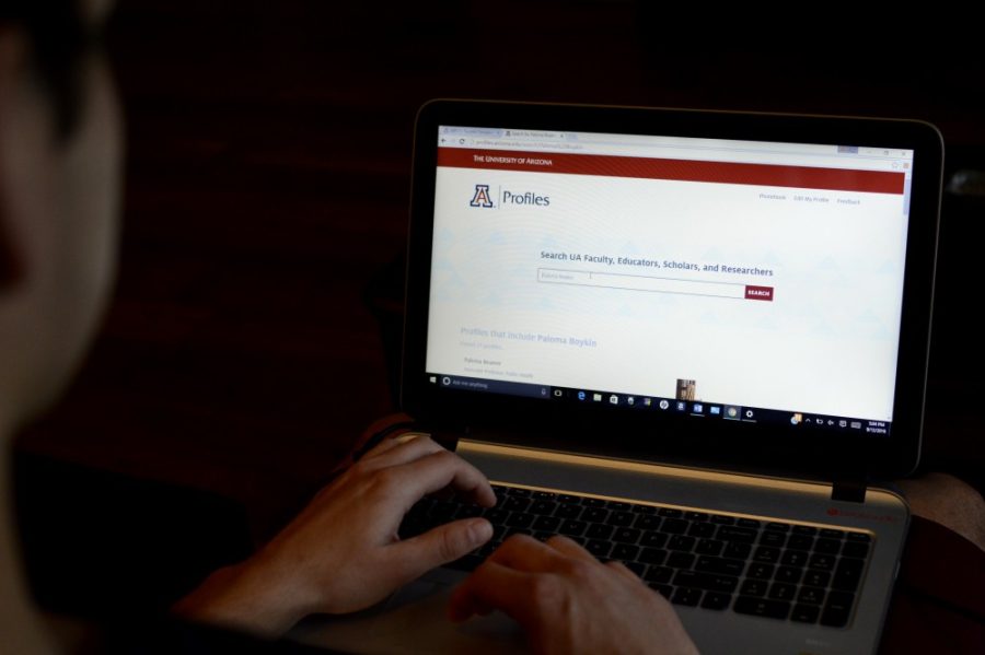 Pre-Business sophomore Trey Kerns searches advisors and professors on the UA Profiles website on Monday afternoon. The new directory will offer the public more access to UA facultys academic history and research. 