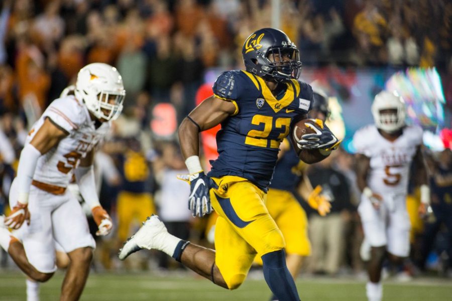 California running back Vic Enwere (23) carries the ball in a matchup against the Texas Longhorns at California Memorial Stadium in Berkeley, California, on Saturday, Sept. 17. Cal upset No. 11 Texas 50-43, but failed to make an appearance in the top 25. 
