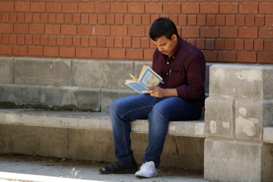 Engineering freshman Khaled Aljabali reads a book on Thursday, Sept. 8. Aliabali is an international student from Kuwait whose favorite thing about the UA is his professors.