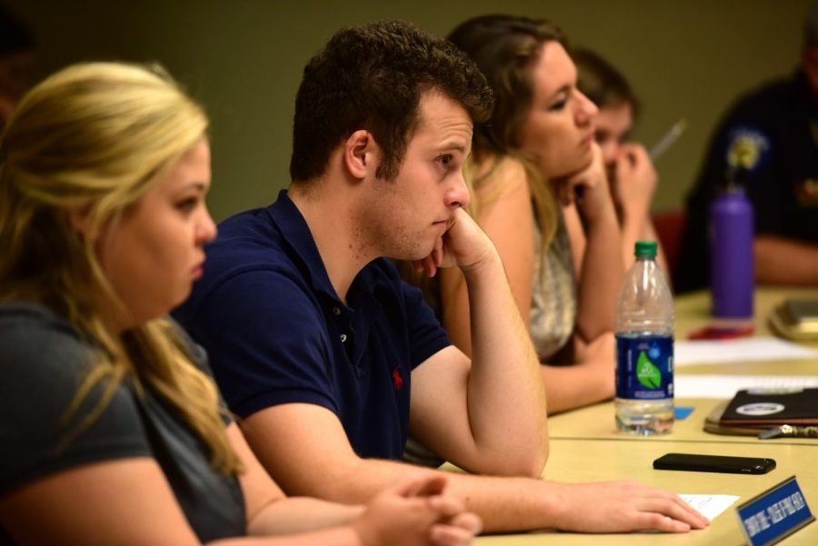 Associated Students of the University of Arizona Sen. Jonah Soble listens during an ASUA meeting in the Student Union Memorial Center on Aug. 24. At their second meeting of the year, ASUA senators talked about stipends and senate structure.