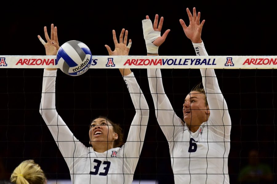 Arizona middle blocker Jade Turner (33) and outside hitter Katarina Pilepic (6) defend against a short ball during Arizonas 3-0 win against Alabama State in McKale Center on Friday, Sept. 2, 2016.