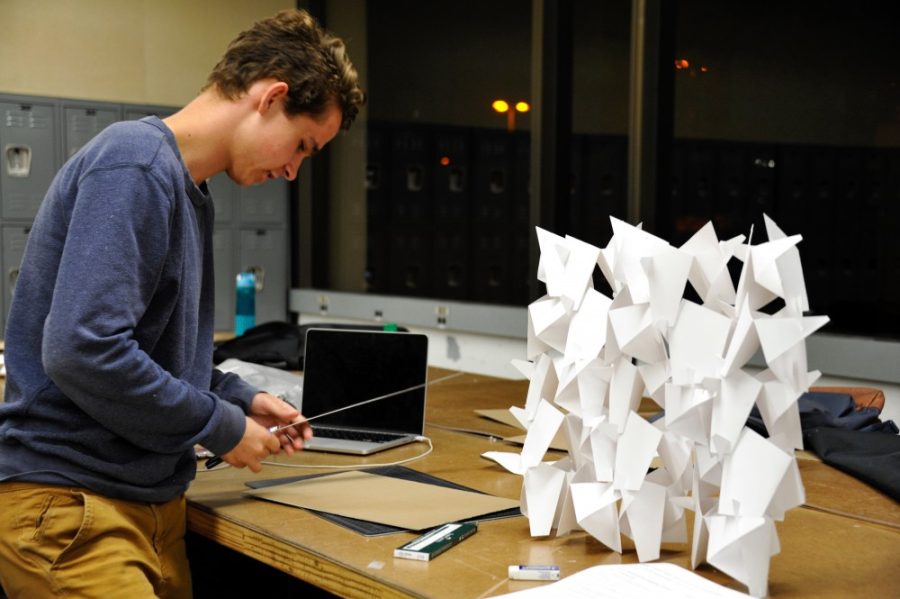 First-year architecture student Cameron Bird works on a project for his studio class in the evening on Tuesday, Oct. 4. The UA College of Architecture, Planning and Landscape Architecture recently received accreditation for eight years.