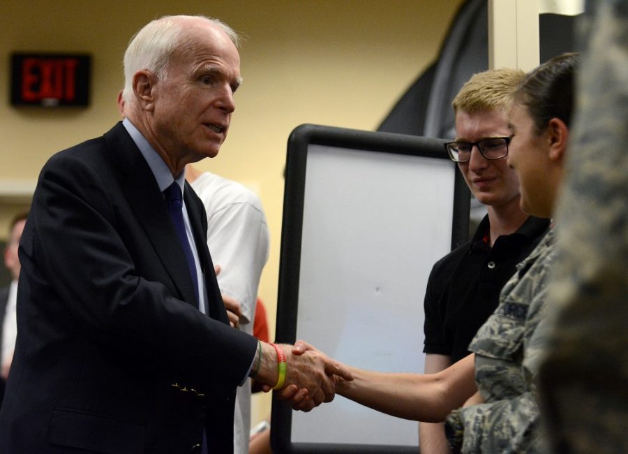 Senator John McCain greets veterans in the VET Center inside the Student Union Memorial Center on Thursday, Oct. 13, 2016. McCain spoke briefly about issues facing veterans he is working on in Congress and answered several questions from the audience.