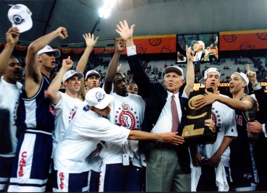 <p>(Courtesy Arizona Athletics) Lute Olson celebrates with his team after Arizona beat Kentucky for the National Championship in 1997. The Wildcats knocked off three No. 1 seeds en route to the program's lone national championship. </p>