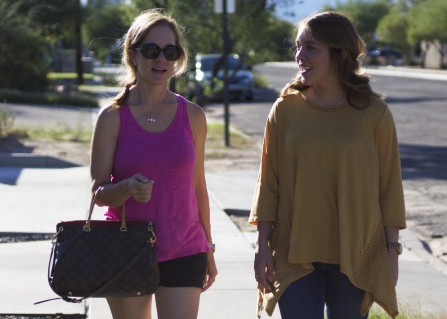 Tatum Hammond (right), English studies senior and ASUA administrative vice president, and her mother Colleen Hammond (left) go for a walk just outside of campus on Monday, Oct. 10 in Tucson, Arizona. Tatum’s mother was visiting for the day from Chandler, Ariz. just before family weekend.