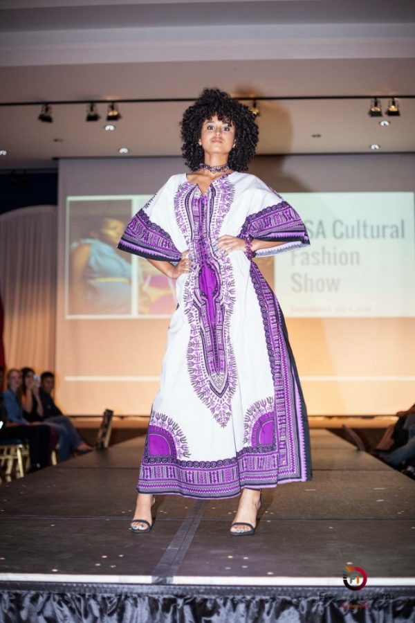 Model poses on the runway during the 2015 cultural fashion show hosted by ASA. This years show will showcase styles from all around the African continent.