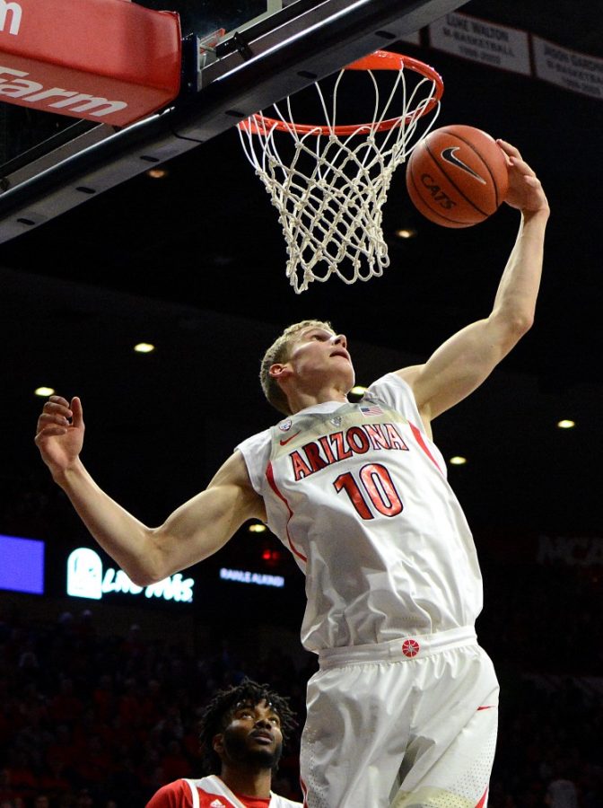 Arizona forward Lauri Markkanen (10) snags a rebound after a failed shot by Sacred Heart in McKale Center on Friday, Nov. 18. The Wildcats beat the Pioneers 95-65.