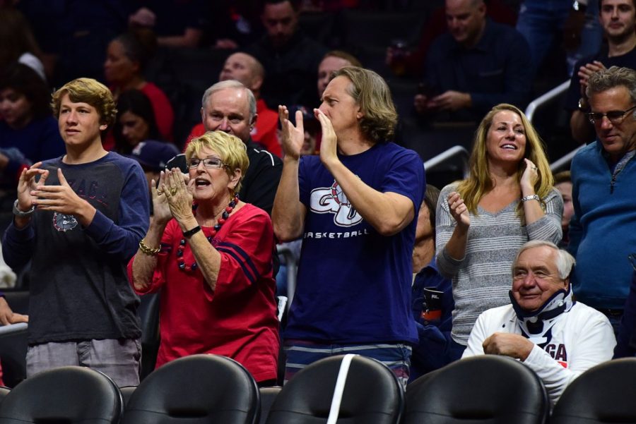Gonzaga fans cheer on their basketball team in a sparce Staples Center fror the Gonzaga vs Arizona game on Friday, Dec. 3 in Los Angeles, Calif.