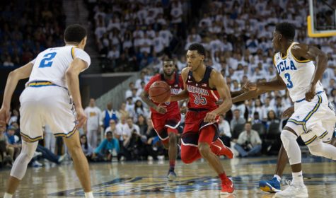 Allonzo Trier dribbles down the court, in Pauley Pavilion, on Jan. 21. Trier finished the game with 12 points and seven rebounds in his first game this season due to a suspension for PED's.