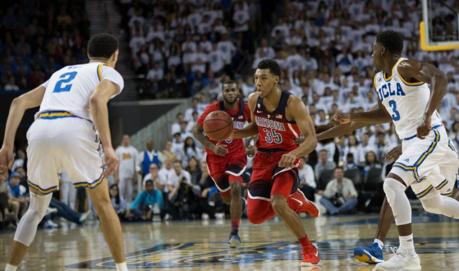Allonzo Trier dribbles down the court, in Pauley Pavilion, on Jan. 21. Trier finished the game with 12 points and seven rebounds in his first game this season due to a suspension for PEDs.