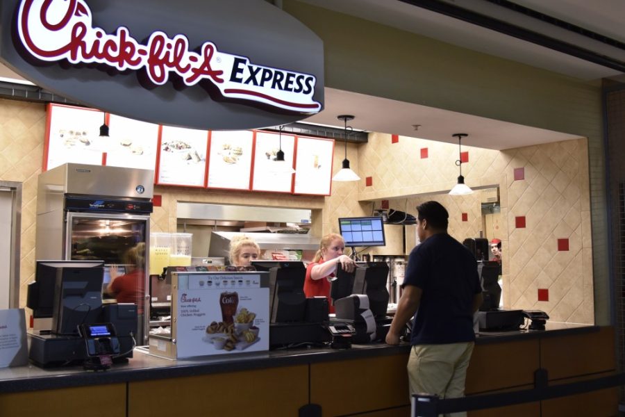 A student orders at Chick-fil-A Express in the Student Union Memorial Center food court on Jan. 26, 2017.