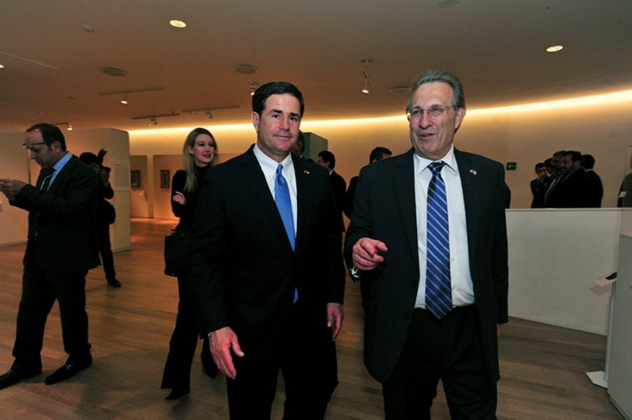 Arizona Gov. Doug Ducey (left) in Mexico City. Duceys Executive Budget proposal would give universities an exemption from sales tax at the expense of the cities in which they operate.