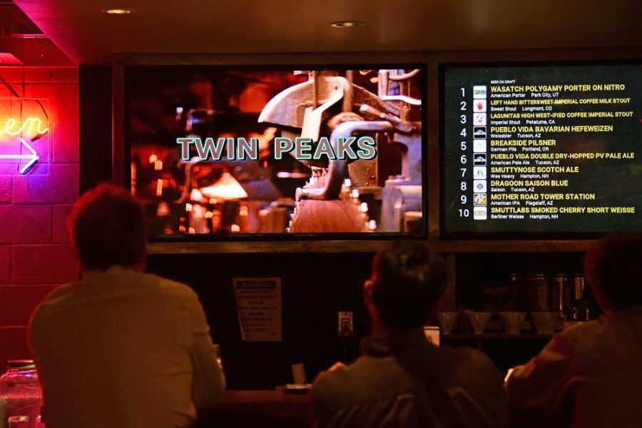 Patrons watch the opening credits during a showing of an episode of Twin Peaks in the Casa Film Bar in Casa Video on Sunday, Feb. 12, 2017. After a 26 year hiatus, the television series is making its much anticipated return on May 21, 2017. 