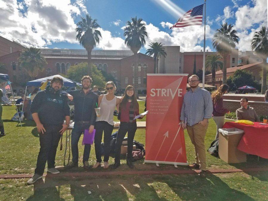 STRIVE members table at the Spring Club Fair. STRIVE has clubs on different college campuses.