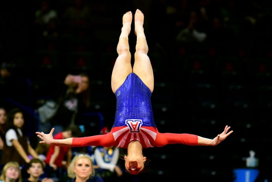 Selynna+Felix-Terrazas+suspended+in+midair+during+Arizonas+194.025-191.600+win+over+Utah+State+and+Texas+Womans+University+in+McKale+Center+on+Friday%2C+Jan.+6.