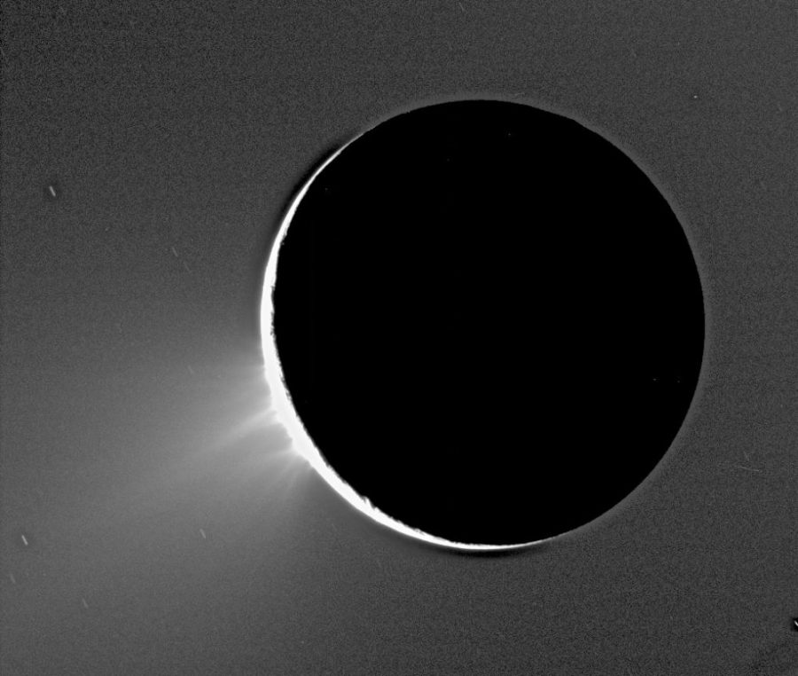 Recent Cassini images of Saturns moon Enceladus backlit by the sun show the fountain-like sources of the fine spray of material that towers over the south polar region. The cryovolcano Ahuna Mons on Ceres is a similar feature.