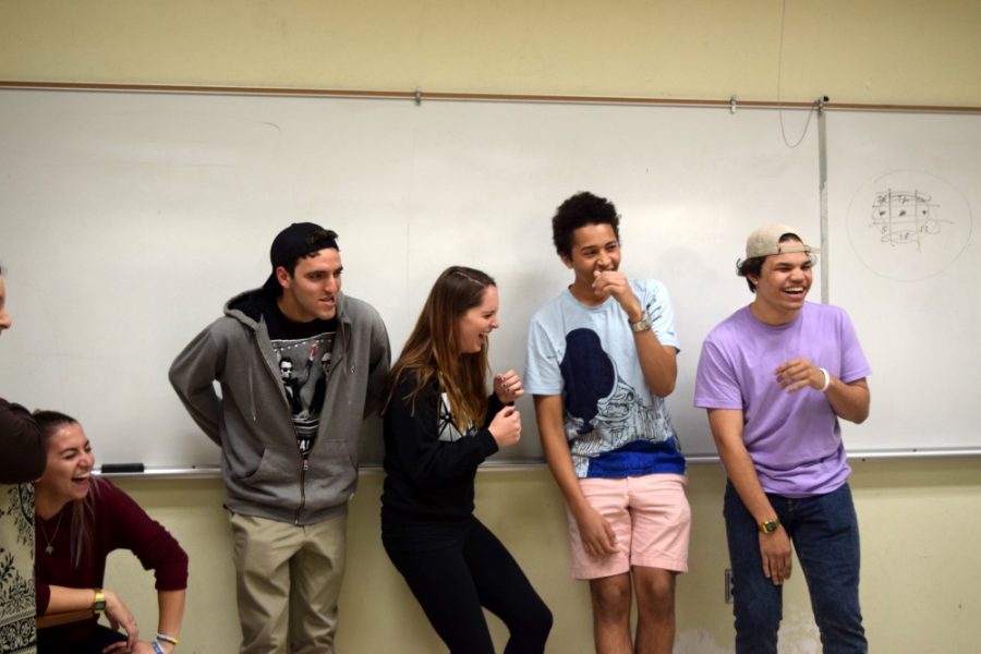 From left to right: Comedy Corner members Sam Weisband, Ben Weinstein, Rebecca Wendler, Griffin Riley and Nikki Moore watch as their peers participate in an improvisation game on Monday, Feb. 6. The game required each member to improvise a scene acting as a character they frequently play.