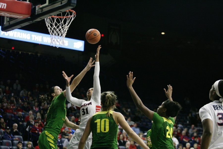 Arizonas Dejza James (31) attempts a shot during the womens basketball game against Oregon on Feb. 3. The Wildcats lost 79-65 to the Ducks.