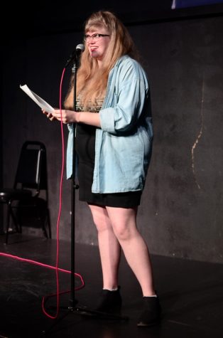 Anna Stokes, presenting on behalf of FST! Female Storytellers at the Tucson Improv Movement Theater on the street, on Feb. 23.