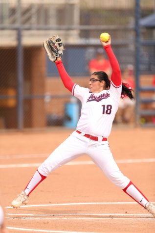 Arizona pitcher Taylor McQuillin (18) throws a pitch at Hillenbrand Memorial Stadium in Tucson during the Wildcats' 4-2 loss to the Dukes on Sunday, March 6.