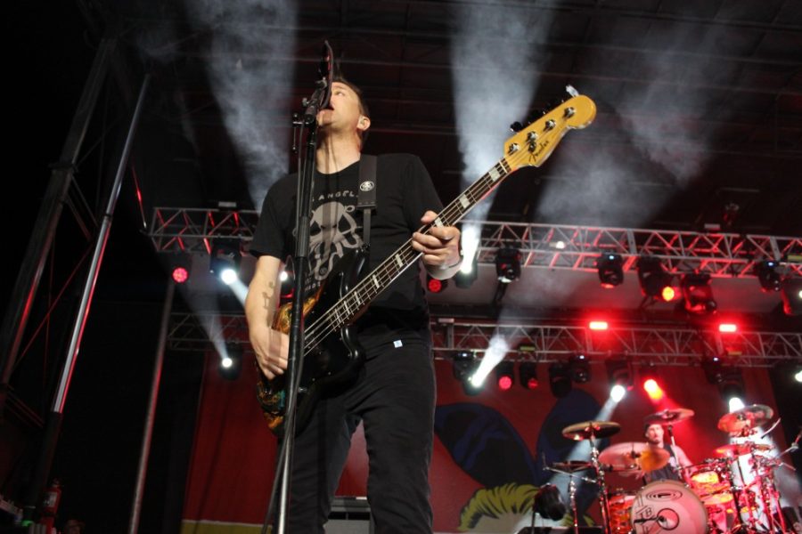 Lead bassist and co-vocalist of Blink-182 Mark Hoppus sporting his brand Hi, My Name is Mark and rocking out for KFMA Day on March 26. This is the bands first performance in Tucson, Arizona.