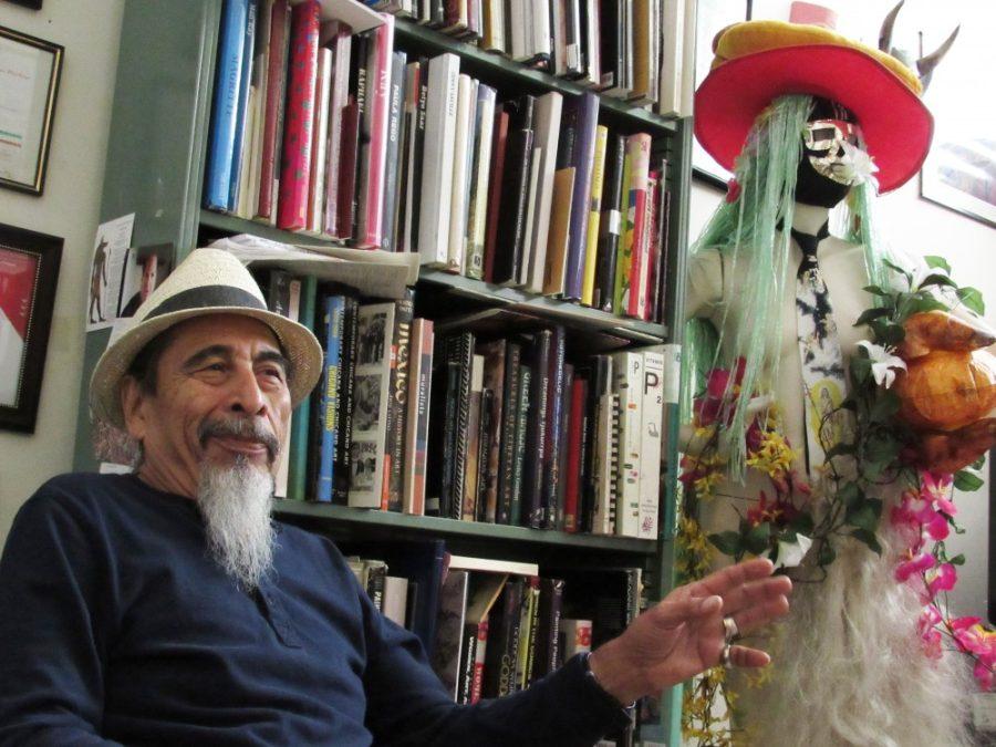 Art professor Alfred Quiroz tells of his life experiences, which culminate with his tenure at the UA in his office at the School of Art on March 8. Professor Quiroz is currently transitioning into retirement after serving in a variety of roles throughout his art career.