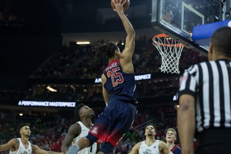 Arizona's Keanu Pinder slam dunks during the Pac-12 Championship against Oregon on Saturday, March 11. The Wildcats beat the Ducks 83-80. 