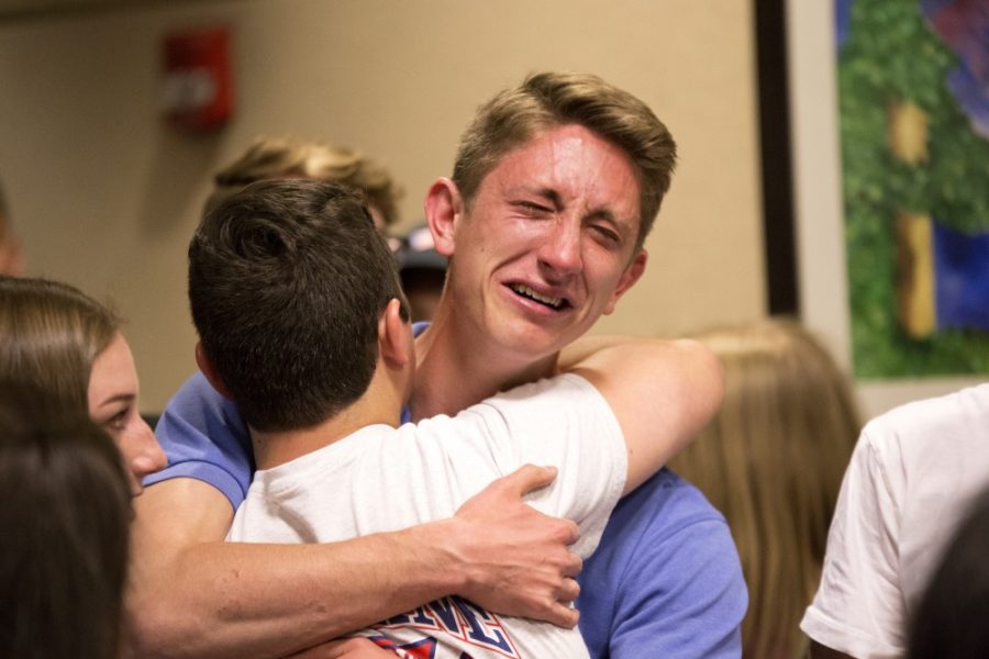 Presidential candidate Matt Lubisich hugs friend after hearing election results. Lubisich received more votes than candidate Stefano Saltalamacchia for ASUA President, however his disqualification was pending review by the elections commission. The commission over turned the disqualification making him president-elect. 