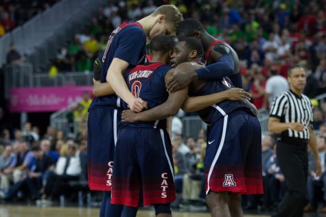 From left to right; Arizona's Lauri Markkanen, Parker Jackson-Cartwright, Kadeem Allen, and Rawle Alkins huddle together before a free throw during the Pac-12 Championship game between Arizona and Oregon. Arizona won the Pac-12 Tournament Championship for the second time under head coach Sean Miller. 