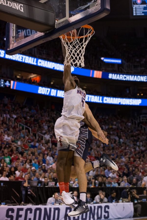 Arizonas Kadeem Allen (5) makes a lay up during the UA-SMC game on Saturday, March 18.
