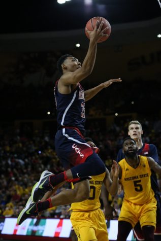 Arizona's Allonzo Trier shoots during the UA-ASU game on Saturday, March 4. 