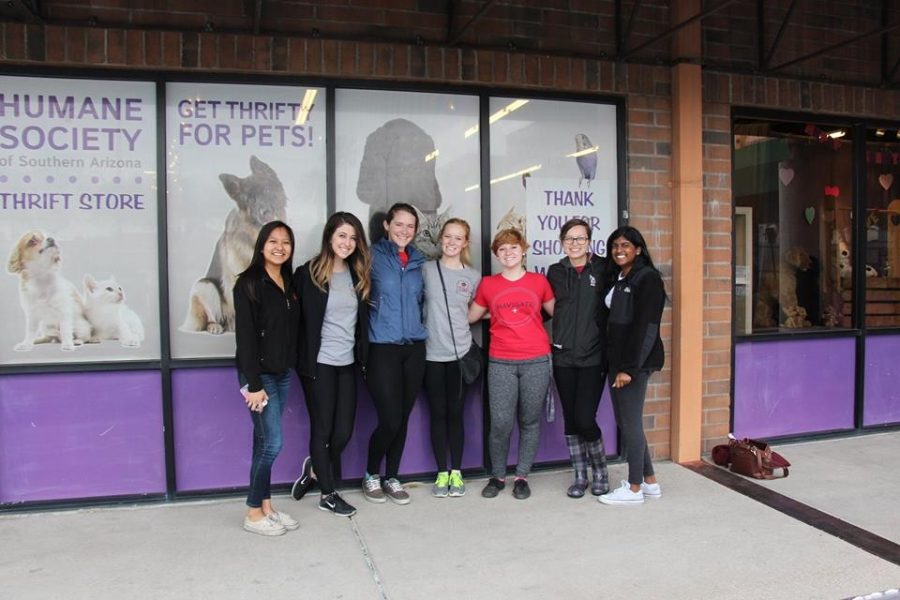 Students stand outside the Humane Society Thrift Store. Wildcats CARE volunteers with a variety of organizations throughout the year.