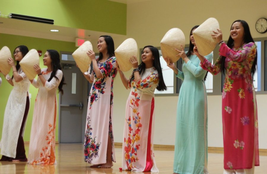 Miss Vietnam Southern Arizona candidates practice their dance in the Larson Room at the Rec Center on March 26. The event demonstrates elegance in the portrayal Vietnamese womens beauty.