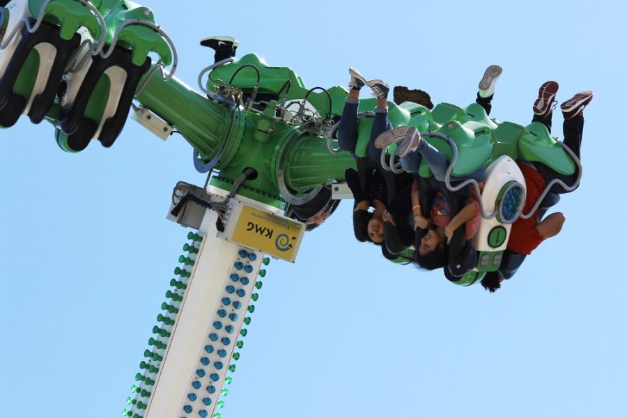 People flipped upside down on a ride at Spring Fling on the UA Mall on April 9, 2016. The amount of rides at Spring Fling increased after the carnival was moved to the UA Mall four years ago.