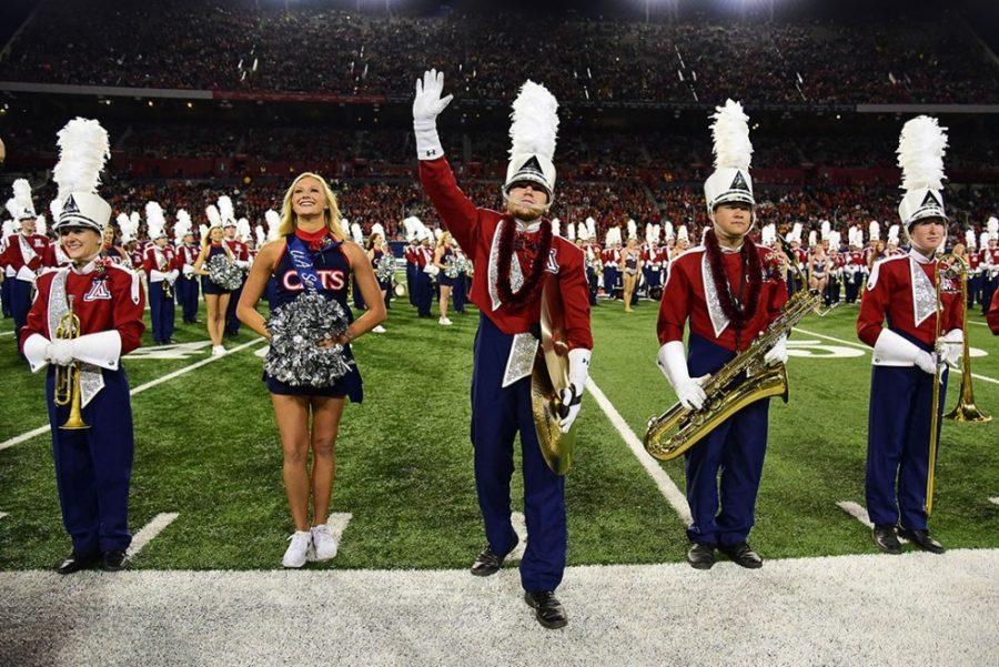 Senior members of the Pride of Arizona wave farewell to the crowd after their final half time show during Arizonas 56-35 win against ASU in Arizona Stadium on Nov. 25, 2016. Don Haskell was the voice of the Pride of Arizona for more than 25 years.