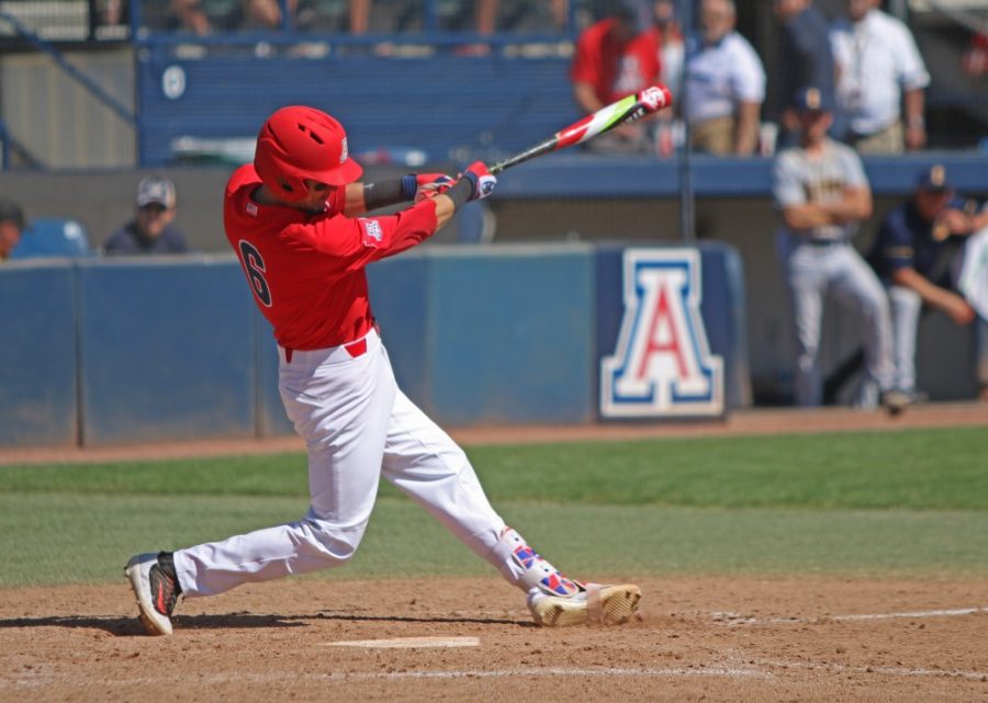 Arizona catcher Ryan Haug (6) bats during the baseball game against California on May 28 at Hi Corbett Field.